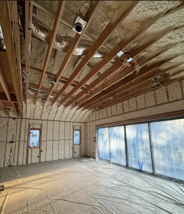 Interior walls and ceiling insulated with spray foam during new construction in Willow Park